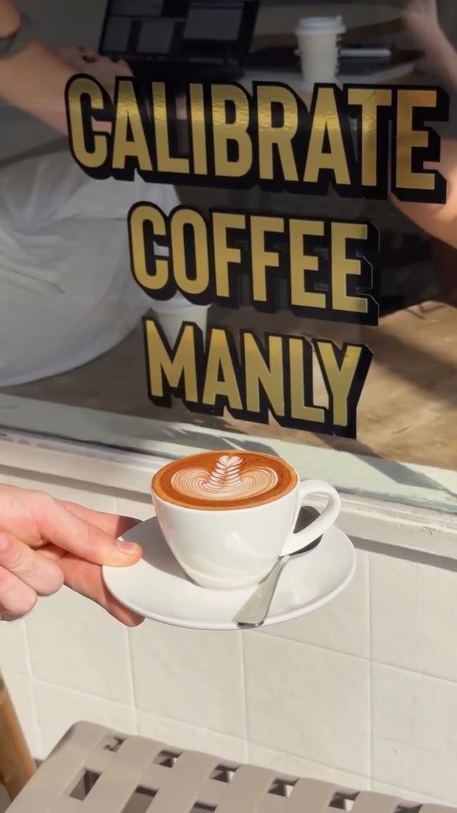 Calibrate Coffee signage with latte
